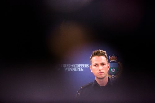 MIKAELA MACKENZIE / WINNIPEG FREE PRESS
Constable Jay Murray speaks about a fraud charge and firearms arrests and concerns at a press conference in Winnipeg on Wednesday, Oct. 10, 2018.
Winnipeg Free Press 2018.