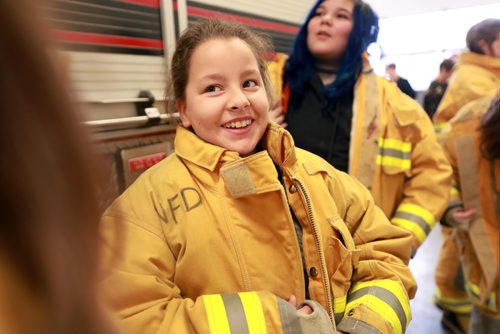 RUTH BONNEVILLE / WINNIPEG FREE PRESS

Standup photo

Grade six student, Bailey Hatch, tries on firefighter gear at Number 11 Fire Station along with their classmates from Hedge Middle School, Thursday.  The outing was in honour of the International Day of the Girl which was being recognized by the Winnipeg Fire Paramedic Service (WFPS) partnered with the Government of Manitobas Status of Women which hosted groups of Winnipeg girls at four WFPS locations in Winnipeg.  The purpose of these visits was to ensure young girls know that careers in the Fire and Paramedic Service are within their grasp.


More Info below: 
Approximately 100 sixth grade girls from four Winnipeg schools had the opportunity to participate in WFPS station tours, ask questions to female responders and try their hand at a variety of drills and demonstrations, including learning about CPR, trying on firefighter turn out gear and learning stretcher and hose handling skills.

Today is International Day of the Girl, and this years theme centres around preparing girls for the workforce, said Manitoba Sustainable Development Minister Rochelle Squires, minister responsible for the status of women. This event reminds us that no career goal is off limits for girls, including the Winnipeg Fire and Paramedic Service. I hope the girls participating today have fun, make new friends and come away with greater confidence in their abilities.

Currently, within the WFPS firefighting ranks, approximately five per cent of staff identify as female. Within EMS, that number jumps to approximately 35 per cent. Research states that many young people start leaning towards their particular career interests by approximately 12 years old, which is why todays event is aimed at girls of this age.

Standup photo 

October 11, 2018