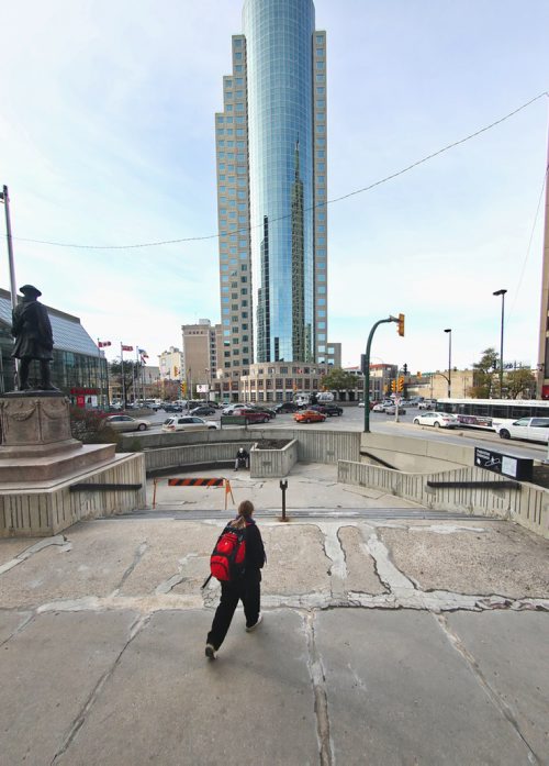 MIKE DEAL / WINNIPEG FREE PRESS
The courtyard at the Bank of Montreal corner of Portage and Main is showing its age with surging concrete pavement and awkwardly patched cracks. 
181012 - Friday, October 12, 2018