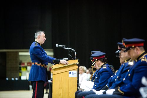 MIKAELA MACKENZIE / WINNIPEG FREE PRESS
Valedictorian Bryan Romaniuk speaks at the graduation ceremony for recruit class 161 and 161 lateral takes place at the RBC Convention Centre in Winnipeg on Friday, Oct. 12, 2018. 
Winnipeg Free Press 2018.