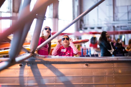 MIKAELA MACKENZIE / WINNIPEG FREE PRESS
Piper Schell (left) and J'Anna Bazylo explore at aviation day at the Royal Aviation Museum of Western Canada in Winnipeg on Saturday, Oct. 13, 2018. 
Winnipeg Free Press 2018.
