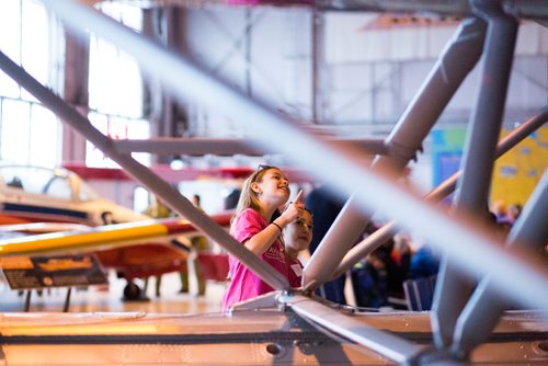 MIKAELA MACKENZIE / WINNIPEG FREE PRESS
Piper Schell (left) and J'Anna Bazylo explore at aviation day at the Royal Aviation Museum of Western Canada in Winnipeg on Saturday, Oct. 13, 2018. 
Winnipeg Free Press 2018.