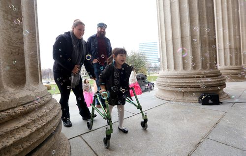 TREVOR HAGAN / WINNIPEG FREE PRESS
Hope Kham, 5, with Jenna Kham and David Wahlstrom at "Castle Chavella" at the Manitoba Legislative Building, as more than 100 young girls, including 70 battling life threatening or chronic illness were crowned Princess for a Day, Sunday, October 14, 2018.