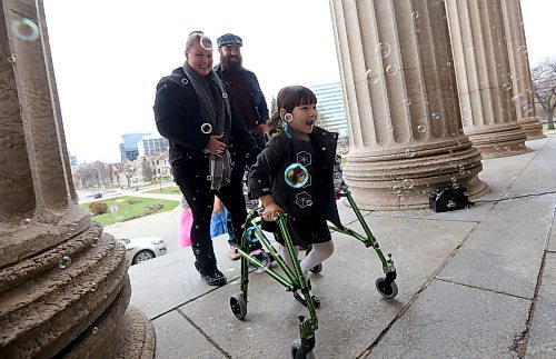 TREVOR HAGAN / WINNIPEG FREE PRESS

Hope Kham, 5, with Jenna Kham and David Wahlstrom at &quot;Castle Chavella&quot; at the Manitoba Legislative Building, as more than 100 young girls, including 70 battling life threatening or chronic illness were crowned Princess for a Day, Sunday, October 14, 2018.