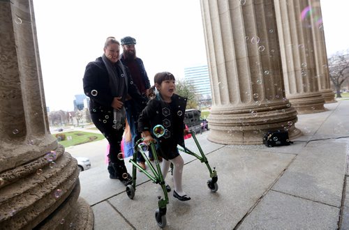 TREVOR HAGAN / WINNIPEG FREE PRESS
Hope Kham, 5, with Jenna Kham and David Wahlstrom at "Castle Chavella" at the Manitoba Legislative Building, as more than 100 young girls, including 70 battling life threatening or chronic illness were crowned Princess for a Day, Sunday, October 14, 2018.