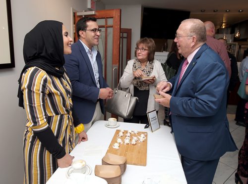 JASON HALSTEAD / WINNIPEG FREE PRESS

Manitoba Agriculture Minister Ralph Eichler (right) and his wife Gail Eichler (second right) try out Louis Lavender ice cream provided by Zainab Ali (left) and Joseph Chaeban of Chaeban Ice Cream during the 12th Great Manitoba Food Fight on Sept. 19, 2018 at De Lucas Cooking Studio. (See Social Page)