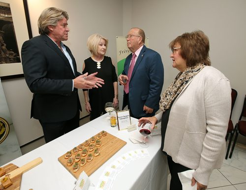 JASON HALSTEAD / WINNIPEG FREE PRESS

Manitoba Agriculture Minister Ralph Eichler (second right) and his wife Gail Eichler (right) try out Tony's Pâté with Laurent Jacques (Frères Jacques Specialty Patés) and his partner Shirlee during the 12th Great Manitoba Food Fight on Sept. 19, 2018 at De Lucas Cooking Studio. (See Social Page)