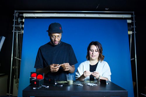 MIKAELA MACKENZIE / WINNIPEG FREE PRESS
Dillin Morgan teaches Jenn Zoratti how to roll a joint (using catnip as a substitute for cannabis) in Winnipeg on Monday, Oct. 15, 2018. 
Winnipeg Free Press 2018.