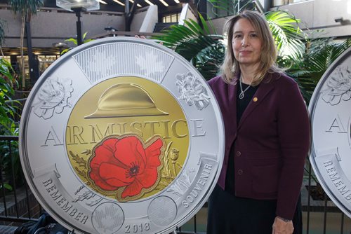 MIKE DEAL / WINNIPEG FREE PRESS
Jennifer Camelon, Interim President and CEO of the Royal Canadian Mint during the unveiling of the new coin.
The Royal Canadian Mint announced the issuing of a new two-dollar circulation coin commemorating the 100th anniversary of the Armistice.
The coin recalls the signing of the historic peace treaty ending the First World War on November 11, 1918.
181015 - Monday, October 15, 2018.