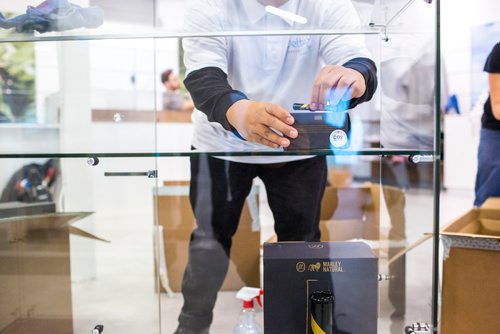 MIKAELA MACKENZIE / WINNIPEG FREE PRESS
Ruel Bantados stocks glassware display cases as the Delta 9 cannabis store prepares for opening day in Winnipeg on Tuesday, Oct. 16, 2018. 
Winnipeg Free Press 2018.