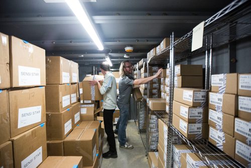 MIKAELA MACKENZIE / WINNIPEG FREE PRESS
Donnie Smith, assistant manager (right), unpacks inventory in the vault with store manager Chad LaPointe at the Delta 9 cannabis store in Winnipeg on Tuesday, Oct. 16, 2018. Smith estimates that there is about 50,000 grams of cannabis in the vault at this time.
Winnipeg Free Press 2018.