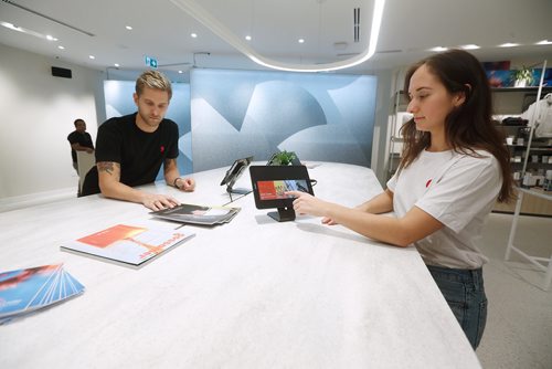 JOHN WOODS / WINNIPEG FREE PRESS
Kevin Starke, retail training manager and Lisa Soparlo, design manager for the cannabis store, Tokyo Smoke, set up tablets at the store's education centre Tuesday, October 16, 2018 prior to opening tomorrow when cannabis becomes legal in Canada.