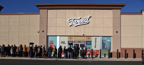 MIKE DEAL / WINNIPEG FREE PRESS
Dozens of people stand outside Tweed on Regent Avenue waiting for a chance to be some of the first in Winnipeg to be able to purchase recreational cannabis legally now that the laws have been changed. 
181017 - Wednesday, October 17, 2018.