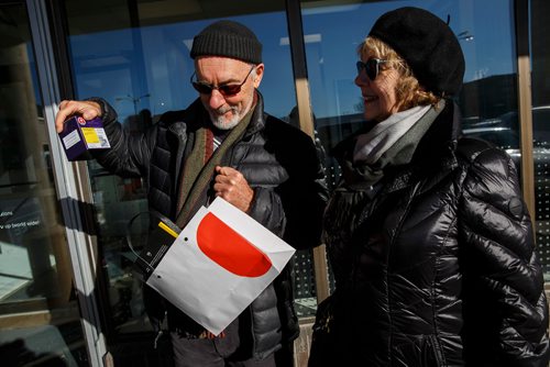 MIKE DEAL / WINNIPEG FREE PRESS
Hubert, 72, and his wife Claudine Bergeron at the opening of Tokyo Smoke are some of the first in Winnipeg to be able to purchase recreational cannabis legally now that the laws have been changed. 
181017 - Wednesday, October 17, 2018.