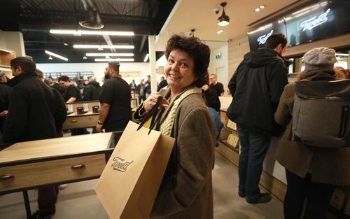 RUTH BONNEVILLE / WINNIPEG FREE PRESS

Tweed Cannabis store located in Osborne Village opens its doors to Cannabis customers on Wednesday morning.  

Susan Gibson finishes making her purchase of cannabis at Tweed store Wednesday.  


October 17, 2018
