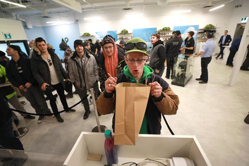 RUTH BONNEVILLE / WINNIPEG FREE PRESS

Delta 9 Cannabis store's 1st customer in line, Steven Stairs, who camped out in his tent from Tuesday evening shows his excitement as he purchases his first order of cannabis at Delta 9 Cannabis store on Dakota Street Wednesday.

See Carol's story.


October 17, 2018