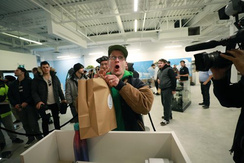 RUTH BONNEVILLE / WINNIPEG FREE PRESS

Delta 9 Cannabis store's 1st customer in line, Steven Stairs, who camped out in his tent from Tuesday evening shows his excitement as he purchases his first order of cannabis at Delta 9 Cannabis store on Dakota Street Wednesday.

See Carol's story.


October 17, 2018