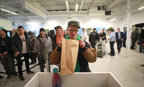 RUTH BONNEVILLE / WINNIPEG FREE PRESS

Delta 9 Cannabis store's 1st customer in line, Steven Stairs, who camped out in his tent from Tuesday evening shows his excitement as he purchases his first order of cannabis at Delta 9 Cannibis store on Dakota Street Wednesday.

See Carol's story.


October 17, 2018