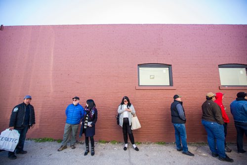 MIKAELA MACKENZIE / WINNIPEG FREE PRESS
Caitlin Turner, a mother of two and a recreational cannabis user, stands in line at Tweed in Winnipeg on Wednesday, Oct. 17, 2018. 
Winnipeg Free Press 2018.