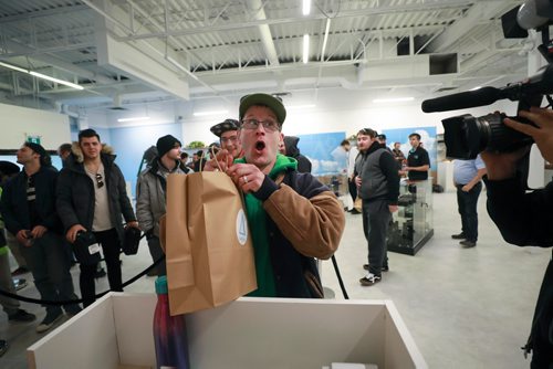 RUTH BONNEVILLE / WINNIPEG FREE PRESS

Delta 9 Cannabis store's 1st customer in line, Steven Stairs, who camped out in his tent from Tuesday evening shows his excitement as he purchases his first order of cannabis at Delta 9 Cannibis store on Dakota Street Wednesday.

See Carol's story.


October 17, 2018