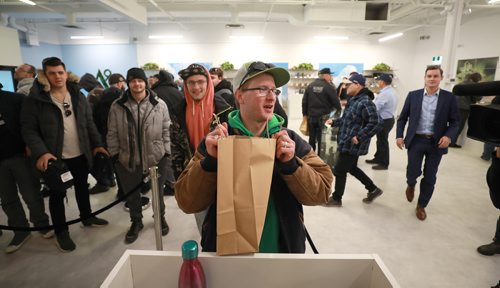 RUTH BONNEVILLE / WINNIPEG FREE PRESS

Delta 9 Cannabis store's 1st customer in line, Steven Stairs, who camped out in his tent from Tuesday evening shows his excitement as he purchases his first order of cannabis at Delta 9 Cannabis store on Dakota Street Wednesday.

See Carol's story.


October 17, 2018