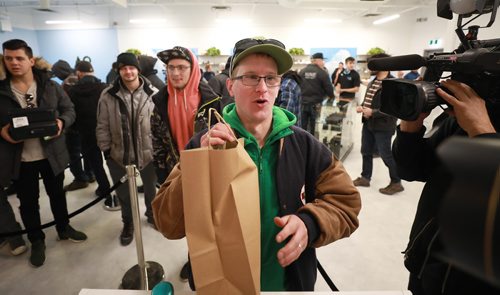 RUTH BONNEVILLE / WINNIPEG FREE PRESS

Delta 9 Cannabis store's 1st customer in line, Steven Stairs, who camped out in his tent from Tuesday evening shows his excitement as he purchases his first order of cannabis at Delta 9 Cannabis store on Dakota Street Wednesday.

See Carol's story.


October 17, 2018