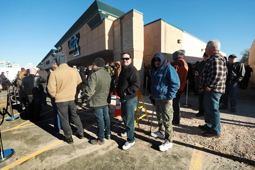 RUTH BONNEVILLE / WINNIPEG FREE PRESS

Delta 9 Cannabis store customers stand in line outside the store on opening day Wednesday.  

See Carol's story.


October 17, 2018