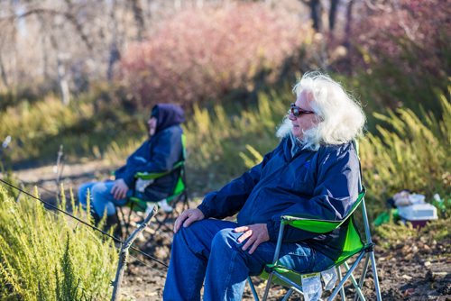 MIKAELA MACKENZIE / WINNIPEG FREE PRESS
Ron Tachnak (right) and his son René enjoy the beautiful weather fishing on the Red River in St. Vital Park in Winnipeg on Thursday, Oct. 18, 2018. 
Winnipeg Free Press 2018.