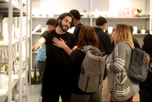 TREVOR HAGAN / WINNIPEG FREE PRESS
Corbin Cyr, of Tokyo Smoke, showing different strains to Carrie Bryson and Kate Urquhart, Thursday, October 18, 2018.