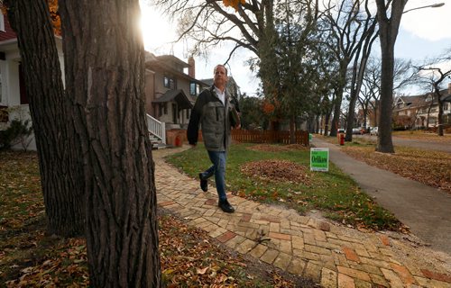 RUTH BONNEVILLE / WINNIPEG FREE PRESS

 John Orlikow goes door to door on Dorchester Ave. canvassing  to be reelected to city councillor in River Heights on Friday.

October 19, 2018