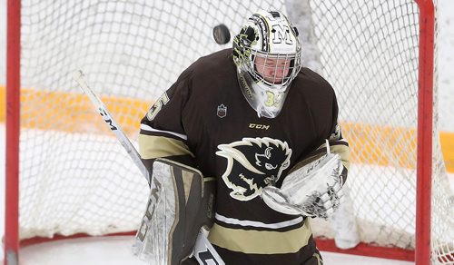 TREVOR HAGAN / WINNIPEG FREE PRESS
Manitoba Bisons' goaltender Byron Spriggs (35) makes a save during first period Canada West hockey action against the University of Regina Cougars, Friday, October 19, 2018.