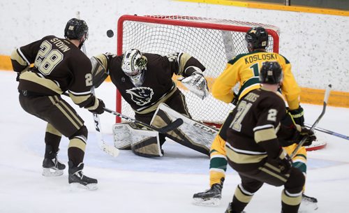 TREVOR HAGAN / WINNIPEG FREE PRESS
Manitoba Bisons' goaltender Byron Spriggs (35) makes an awkward save during first period Canada West hockey action against the University of Regina Cougars, Friday, October 19, 2018.