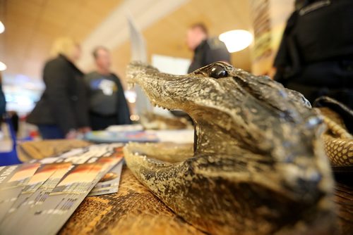 TREVOR HAGAN / WINNIPEG FREE PRESS
Diane and Early Benoit speaking with Border Services Officer, Fred Presber at their display of confiscated items during an open house at the Winnipeg Airport, Saturday, October 20, 2018.