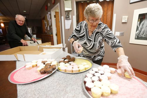 JOHN WOODS / WINNIPEG FREE PRESS
Jeanette Rose sets up trays of cupcakes as her husband Allan makes coffee at Young United Church Sunday, October 21, 2018. Rose volunteers by serving lunch to West Broadway community members.