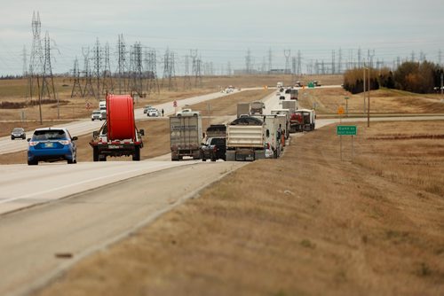 RUTH BONNEVILLE / WINNIPEG FREE PRESS

Trucks and vehicles are backed up along the off ramp to Gunn Rd for hours as a  fire at a asphalt plant near Gunn Rd. billows black smoke over area and into Transcona neighbourhood Monday.  Photo taken looking south on Perimeter Hwy East.   

See Ryan Thorpe story. 




October 22, 2018