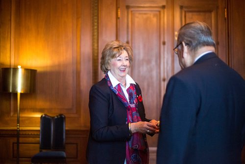 MIKAELA MACKENZIE / WINNIPEG FREE PRESS
Lieutenant-Governor Janice Filmon is presented with the first poppy of this years annual Royal Canadian Legion fundraiser by Comrade Ronn Anderson at the Manitoba Legislative Building in Winnipeg on Tuesday, Oct. 23, 2018. 
Winnipeg Free Press 2018.