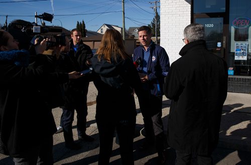 MIKE DEAL / WINNIPEG FREE PRESS
Incumbent Mayor Brian Bowman talks to the media outside of Sugar Blooms and Cakes on McPhillips Street during a stop on his a city-wide blitz to visit each of Winnipegs fifteen civic wards to underscore the importance of being a Mayor for the entire city.
181023 - Tuesday, October 23, 2018.