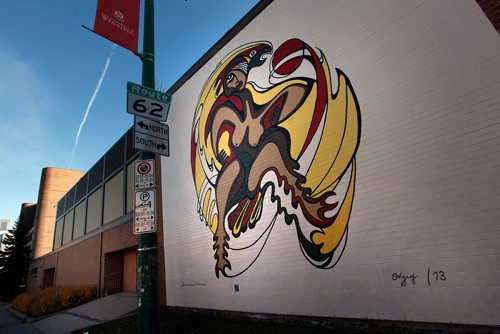 PHIL HOSSACK / WINNIPEG FREE PRESS - The University of Winnipeg, Winnipeg Art Gallery and Wall-to-Wall Mural & Culture Festival come together to create Daphne Odjigs Thunderbird Woman and take steps to Indigenize Winnipegs downtown.
The University of Winnipegs Duckworth Centre is now home to an iconic recreation of Daphne Odjigs Thunderbird Woman. The 32ft by 25ft recreation by artists Mike Valcourt and Peatr Thomas is the last mural painted during Wall-to-Wall Mural and Culture Festival, which ran its longest festival to date, 56 days.- Oct 23, 2018