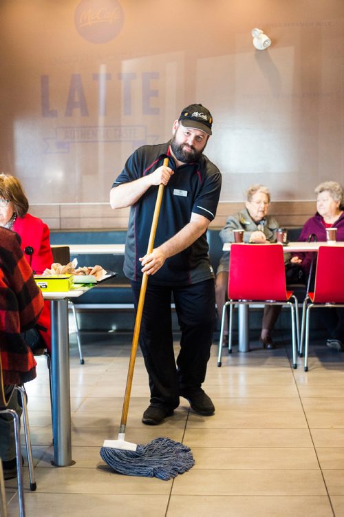 MIKAELA MACKENZIE / WINNIPEG FREE PRESS
Edward Case, an adult living with special needs, cleans tables and mops floors at McDonald's in Winnipeg on Wednesday, Oct. 24, 2018. 
Winnipeg Free Press 2018.