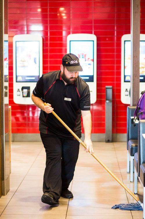 MIKAELA MACKENZIE / WINNIPEG FREE PRESS
Edward Case, an adult living with special needs, cleans tables and mops floors at McDonald's in Winnipeg on Wednesday, Oct. 24, 2018. 
Winnipeg Free Press 2018.