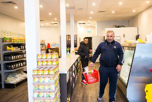 MIKAELA MACKENZIE / WINNIPEG FREE PRESS
The first customer, Waleed Elaissa, at Blady Middle Eastern market in Winnipeg on Friday, Oct. 26, 2018. 
Winnipeg Free Press 2018.