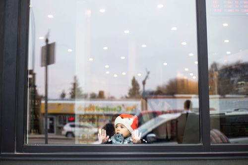 MIKAELA MACKENZIE / WINNIPEG FREE PRESS
Tarik Zeid, two, looks out the window as his mother shops at Blady Middle Eastern market in Winnipeg on Friday, Oct. 26, 2018. 
Winnipeg Free Press 2018.