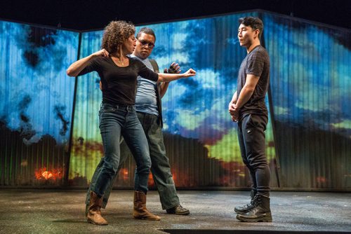 MIKE DEAL / WINNIPEG FREE PRESS
Jacqueline Loewen (left), fight director of the upcoming Warehouse production of Vietgone, works with actors Peter Fernandes (centre) and Simu Liu (right), during a rehearsal on Monday, October 29. The show opens November 1st and runs until the 17th. The play is notable for one elaborate four-minute fight scene based in part on old kung fu movies.
181029 - Monday, October 29, 2018.