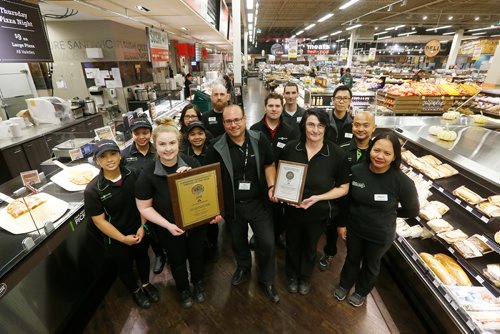 JOHN WOODS / WINNIPEG FREE PRESS
Tim Syba, centre, Save-On Foods store manager, and his team are photographed Monday, October 29, 2018 in their Northgate store which was been named top independent grocer in Canada.