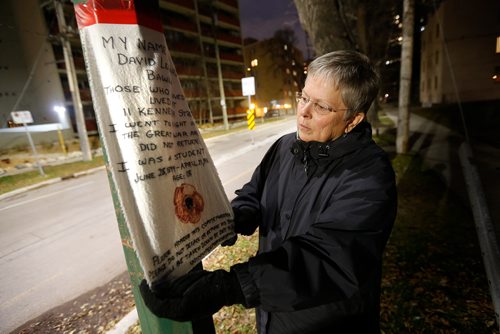 JOHN WOODS / WINNIPEG FREE PRESS
Letty Lawrence, creator of the Loved and Were Loved project, is photographed Monday, October 29, 2018 with the piece in honour of David Leland Bawlf, who was an 18 year old student who lived at 11 Kennedy Street and died in WW1 on April 21, 1918. The project honours soldiers who lived in the communities and died in the world wars.