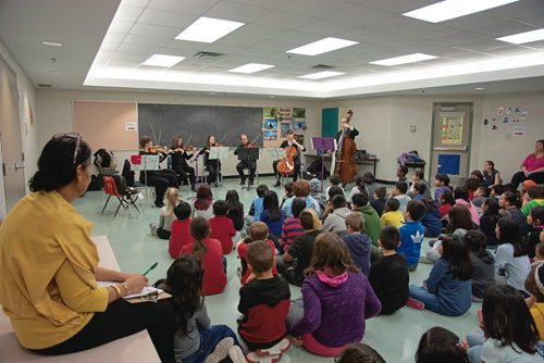 Canstar Community News Oct. 24 - The Winnipeg Symphony Orchestra's string section performs at Greenway School as part of its Bach to School program. (EVA WASNEY/CANSTAR COMMUNITY NEWS/METRO)