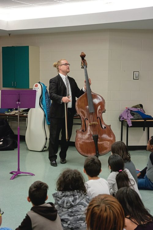 Canstar Community News Oct. 24 - The Winnipeg Symphony Orchestra's string section performs at Greenway School as part of its Bach to School program. (EVA WASNEY/CANSTAR COMMUNITY NEWS/METRO)