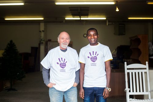 MIKAELA MACKENZIE / WINNIPEG FREE PRESS
Bradley Mackenzie (left) and Augustine Ahishakiye, volunteers at Hands of Hope, pose for a portrait in Winnipeg on Wednesday, Oct. 31, 2018. 
Winnipeg Free Press 2018.