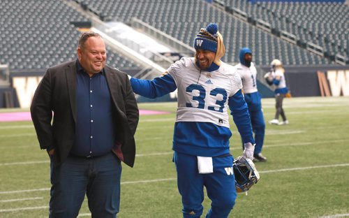 RUTH BONNEVILLE / WINNIPEG FREE PRESS

Winnipeg Blue Bombers practice at Investors Group Field Wednesday.

BB #33 Andrew Harris shares some laughs with Wade Miller, President & CEO of team. 

October 31, 2018