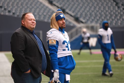 RUTH BONNEVILLE / WINNIPEG FREE PRESS

Winnipeg Blue Bombers practice at Investors Group Field Wednesday.

BB #33 Andrew Harris shares some laughs with Wade Miller, President & CEO of team. 

October 31, 2018